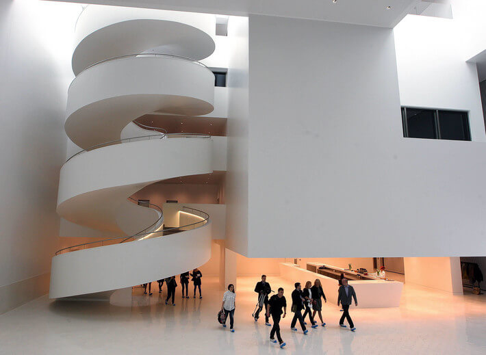 Colour image of the interior spiral staircase inside The Philharmonic Hall (Szczecin, Poland) by Estudio Barozzi Veiga, 2014